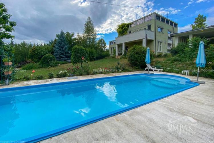  FOTO. Vilă cu piscină din Florești, scoasă la vânzare cu 1,1 milioane de euro: „Are buncăr și e la numai 15 minute de centrul municipiului Cluj-Napoca”