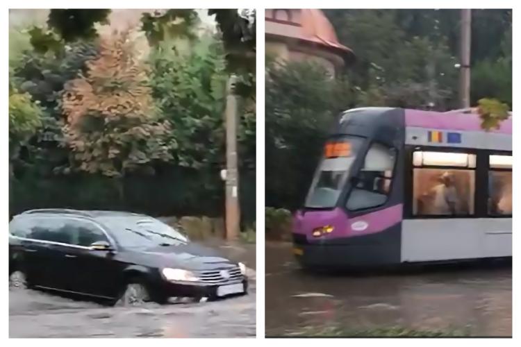 VIDEO Inundații în Cluj-Napoca: Mașini afundate în ape și tramvaie cu dificultăți în Plopilor după ploile torențiale