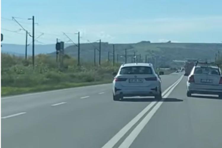 VIDEO Depășire extrem de riscantă, făcută de un șmecher cu BMW, pe un drum din Cluj: „Trimite filmarea la poliție! Sigur va sta minim 3 luni pe tușă”